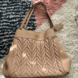 Coach over the shoulder hand bag tan/cream